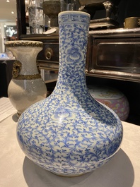 Three Chinese blue and white, crackle-glazed and powder-blue vases, 19th C.