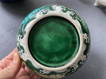 A Chinese verte biscuit 'galloping horses' bowl, Qing