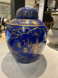 Three Chinese blue and white, crackle-glazed and powder-blue vases, 19th C.