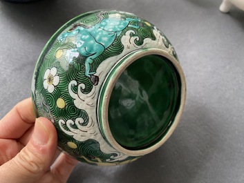 A Chinese verte biscuit 'galloping horses' bowl, Qing