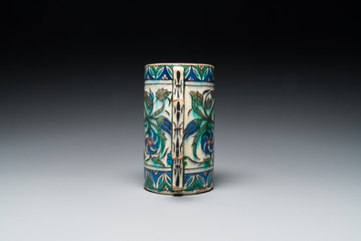 A polychrome Iznik-style mug, Kutahya, Turkey, 19th C.