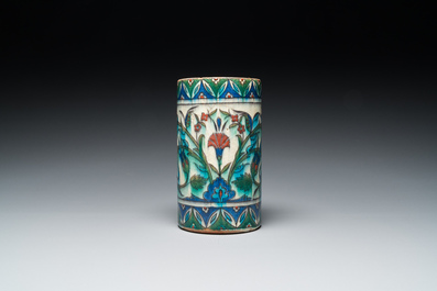 A polychrome Iznik-style mug, Kutahya, Turkey, 19th C.