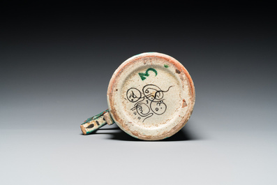 A polychrome Iznik-style mug, Kutahya, Turkey, 19th C.