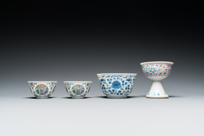 Un bol sur piedouche en porcelaine de Chine famille rose, un bol en bleu et blanc et une paire en doucai, Yongzheng et post&eacute;rieur