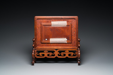 A Chinese famille verte plaque set in a partly huanghuali wooden table screen, Kangxi