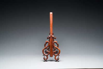 A Chinese famille verte plaque set in a partly huanghuali wooden table screen, Kangxi