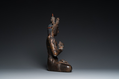 A large Sino-Tibetan gilt-lacquered bronze Budddha, 19/20th C.