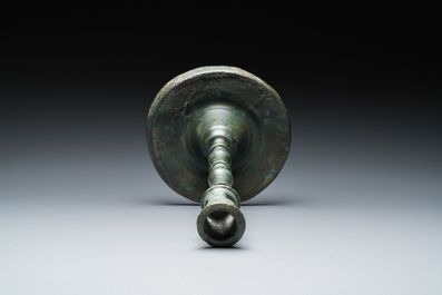 A Dutch or Flemish knotted bronze candlestick, 15th C.
