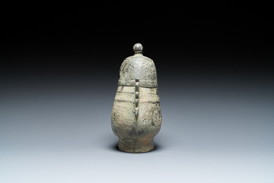 A Chinese bronze 'you' ritual wine ewer, Zhou, ca. 11th-9th C. b.C.