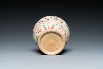 A Vietnamese or Annamese red- and green-enamelled jar with floral design, 14/15th C.