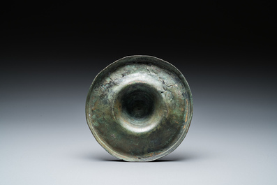 A Dutch or Flemish knotted bronze candlestick, 15th C.