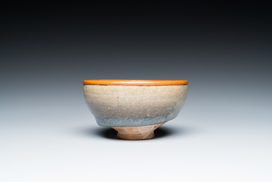 A Chinese junyao bowl with brass rim mount, Song