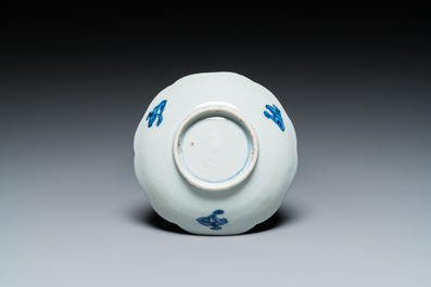 A Chinese blue, white and copper-red flower-shaped ko-sometsuke 'Yin and Yang' bowl for the Japanese market, Tianqi/Chongzhen