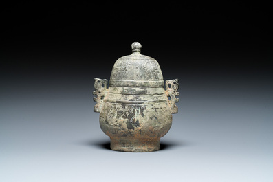 A Chinese bronze 'you' ritual wine ewer, Zhou, ca. 11th-9th C. b.C.