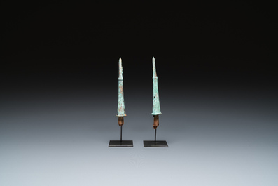 A pair of Chinese bronze finials, Warring States Period, 5th/3rd C. b.C.