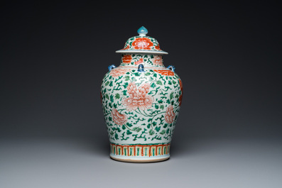A Chinese 'peony scroll' famille verte vase and cover, Kangxi
