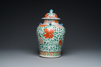 A Chinese 'peony scroll' famille verte vase and cover, Kangxi