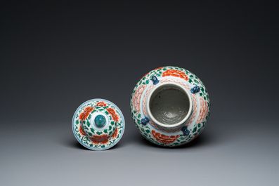 A Chinese 'peony scroll' famille verte vase and cover, Kangxi