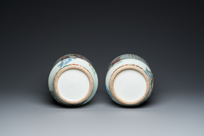 A pair of Chinese Canton famille rose 'immortals' vases, 19th C.