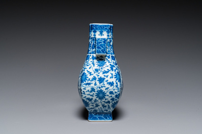 A Chinese blue and white 'fanghu' vase with lotus scrolls, Qianlong mark, 19/20th C.