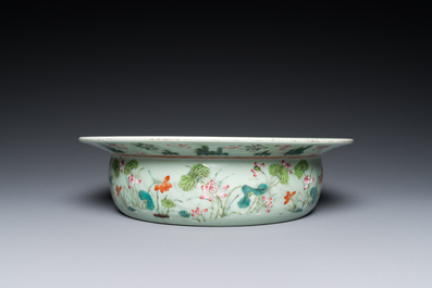 A Chinese famille rose celadon-ground 'carps' basin, 19th C.