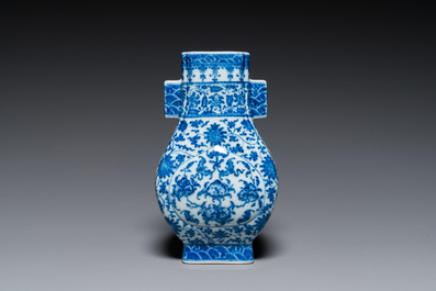 A Chinese blue and white 'fanghu' vase with lotus scrolls, Qianlong mark, 19/20th C.