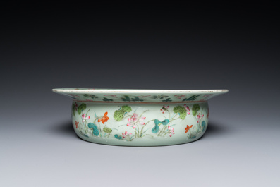 A Chinese famille rose celadon-ground 'carps' basin, 19th C.