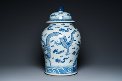 A large Chinese blue and white 'dragons' vase and cover, 19th C.