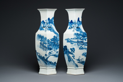 A pair of Chinese blue and white hexagonal 'mountainous landscape' vases, 19th C.