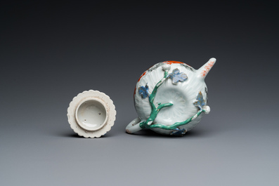 A Chinese iron-red and gilt-decorated 'carps' teapot and cover, Yongzheng