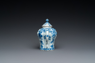 A Chinese blue and white teapot with a phoenix-shaped spout, Kangxi