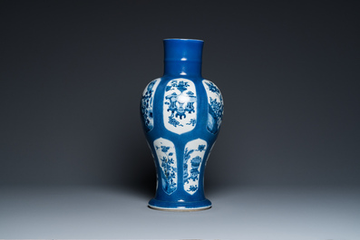 Een Chinese poederblauwe vaas met decor van antiquiteiten, Kangxi