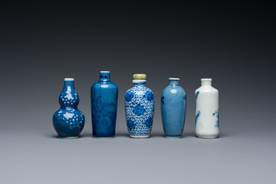 Five Chinese blue and white snuff bottles, 19th C.