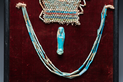 Un masque de momie en r&eacute;sille de perles en fa&iuml;ence, un oushebti et un collier, Egypte, p&eacute;riode ptol&eacute;ma&iuml;que