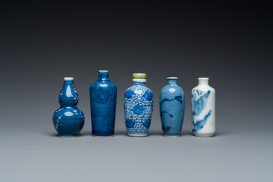 Five Chinese blue and white snuff bottles, 19th C.
