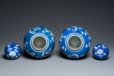 A pair of Chinese blue and white jars and covers, 19th C.