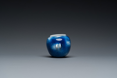 A Chinese powder-blue-glazed bird feeder with a dragon, 19th C.
