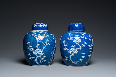 A pair of Chinese blue and white jars and covers, 19th C.
