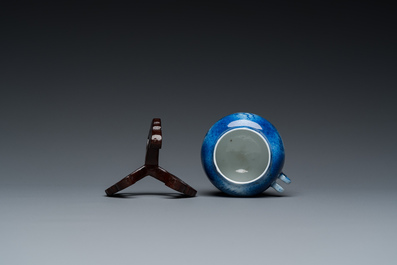 A Chinese powder-blue-glazed bird feeder with a dragon, 19th C.