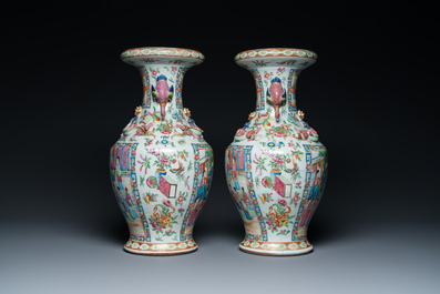 A pair of Chinese Canton famille rose vases with duck-shaped handles, 19th C.