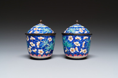 A pair of Chinese blue-ground Canton enamel covered bowls on stands, Qianlong