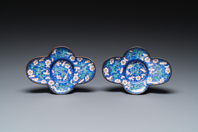 A pair of Chinese blue-ground Canton enamel covered bowls on stands, Qianlong