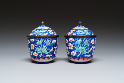 A pair of Chinese blue-ground Canton enamel covered bowls on stands, Qianlong