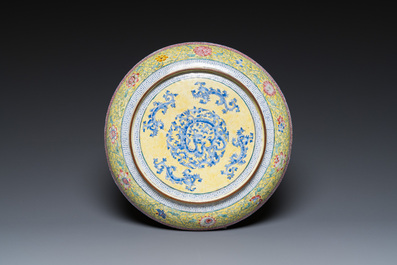 A Chinese Canton enamel dish with a lady and two boys, Yongzheng