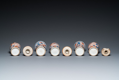 A Chinese grisaille garniture of five 'phoenix' vases, Kangxi/Yongzheng