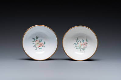 A pair of Chinese yellow-ground Canton enamel bowls, Qianlong/Jiaqing