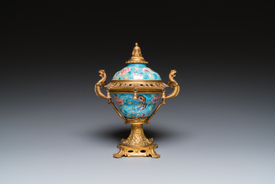 A Chinese Canton enamel bowl and cover with fine gilt bronze mount, Jiaqing