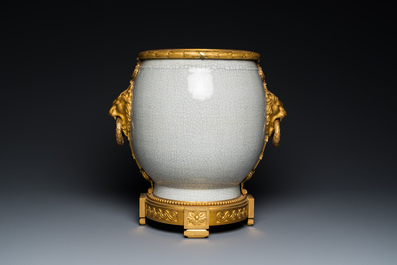 A large Chinese blue and white crackle-glazed 'carps' vase with fine gilt bronze mounts, 18/19th C.