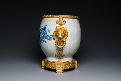 A large Chinese blue and white crackle-glazed 'carps' vase with fine gilt bronze mounts, 18/19th C.