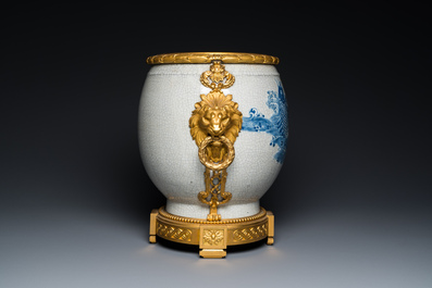 A large Chinese blue and white crackle-glazed 'carps' vase with fine gilt bronze mounts, 18/19th C.